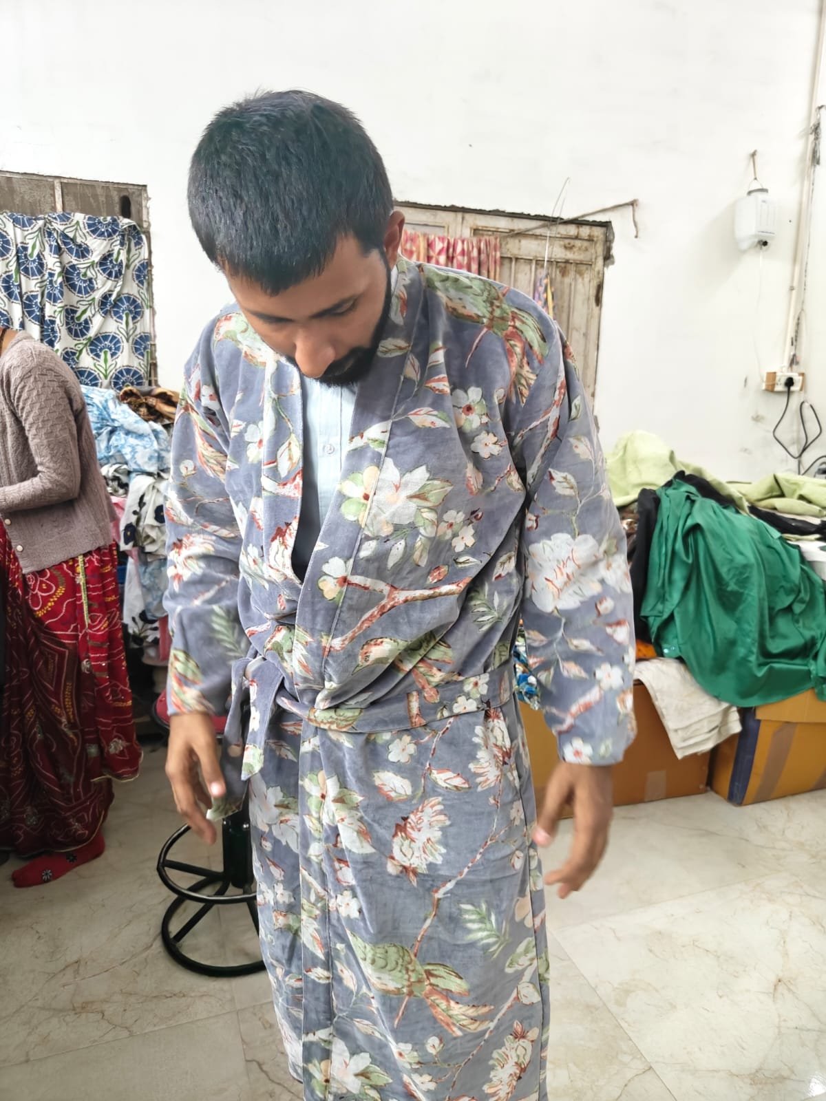 Garment fit and finishing check at supplier workshop
